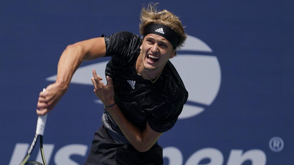 Alexander Zverev serves to Sam Querrey during the first round of the US Open.