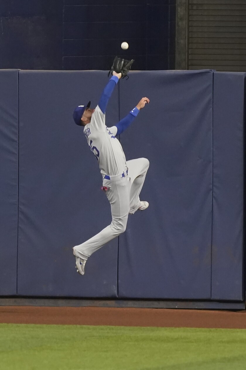 Dodgers center fielder Cody Bellinger catches a drive hit by the Marlins' JJ Bleday in the eighth inning Aug. 26, 2022.