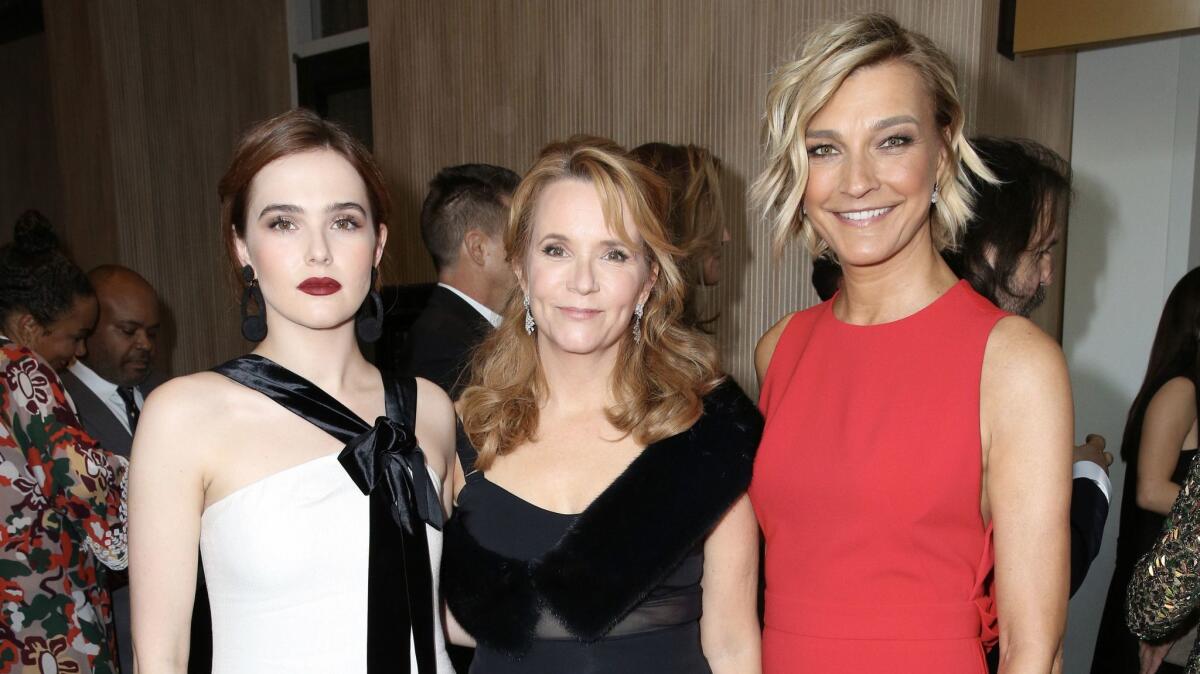 Zoey Deutch, left, her mom, Lea Thompson, and Max Mara brand ambassador Nicola Maramotti attend the Women in Film Crystal + Lucy Awards. (Rachel Murray / Getty Images for Women in Film)