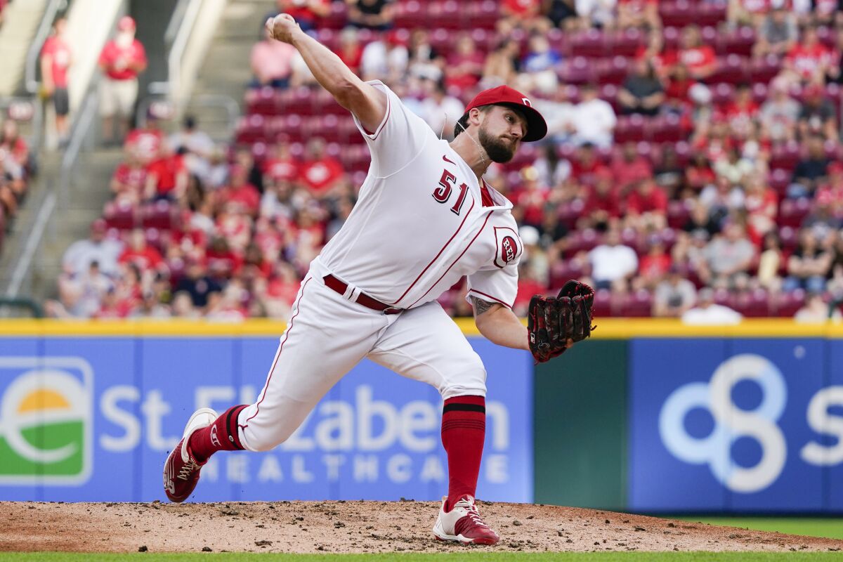 Cincinnati Reds starting pitcher Graham Ashcraft throws during the third inning of the team's baseball game against the Washington Nationals on Thursday, June 2, 2022, in Cincinnati. (AP Photo/Jeff Dean)
