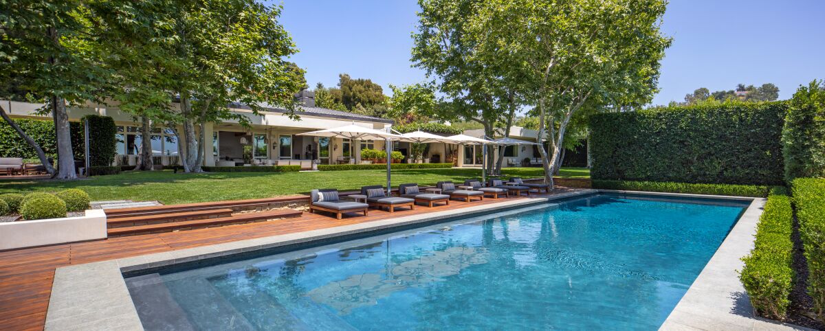 Ryan Seacrest's contemporary compound includes a 9,000-square-foot mansion, two guesthouses and a pool house.