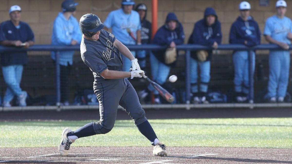 Newport Harbor's Clay Liolios, seen in a Battle of the Bay game at Orange Coast College on March 20, had a pair of doubles in Saturday's nonleague win over Montebello Schurr.