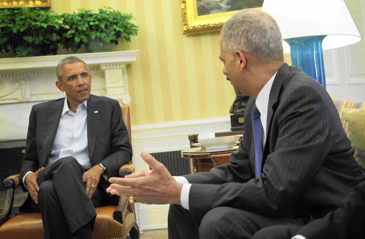 President Obama meets with Atty. Gen. Eric H. Holder Jr. in the Oval Office on Monday.