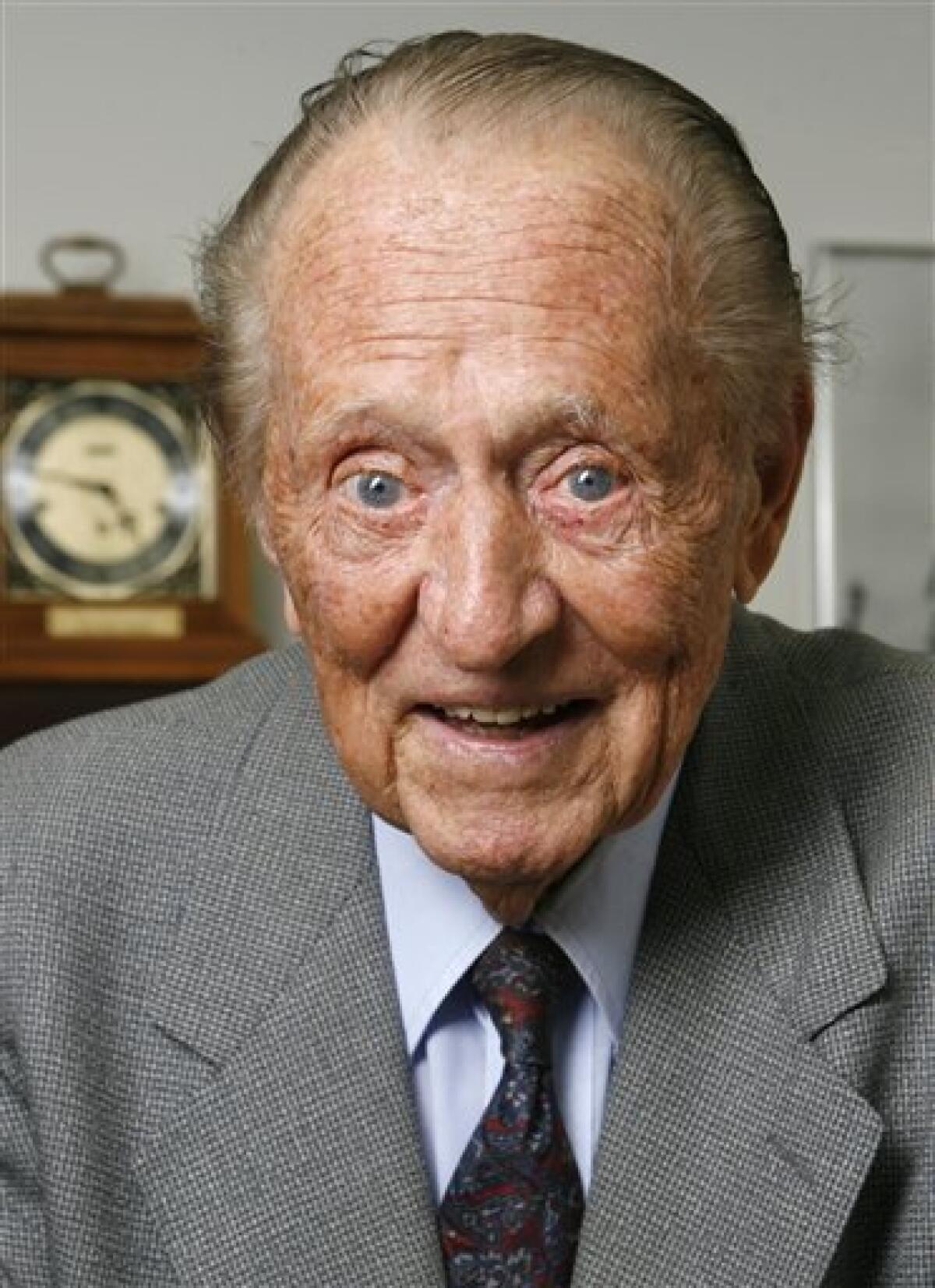 FILE - In this June 27, 2006 file photo, TV personality Art Linkletter poses for a photo at his office in Los Angeles. Linkletter, who hosted the popular TV shows "People Are Funny" and "House Party" in the 1950s and 1960s, died Wednesday, May 26, 2010 at his home in the Bel-Air section of Los Angeles. He was 97. (AP Photo/Damian Dovarganes, file)