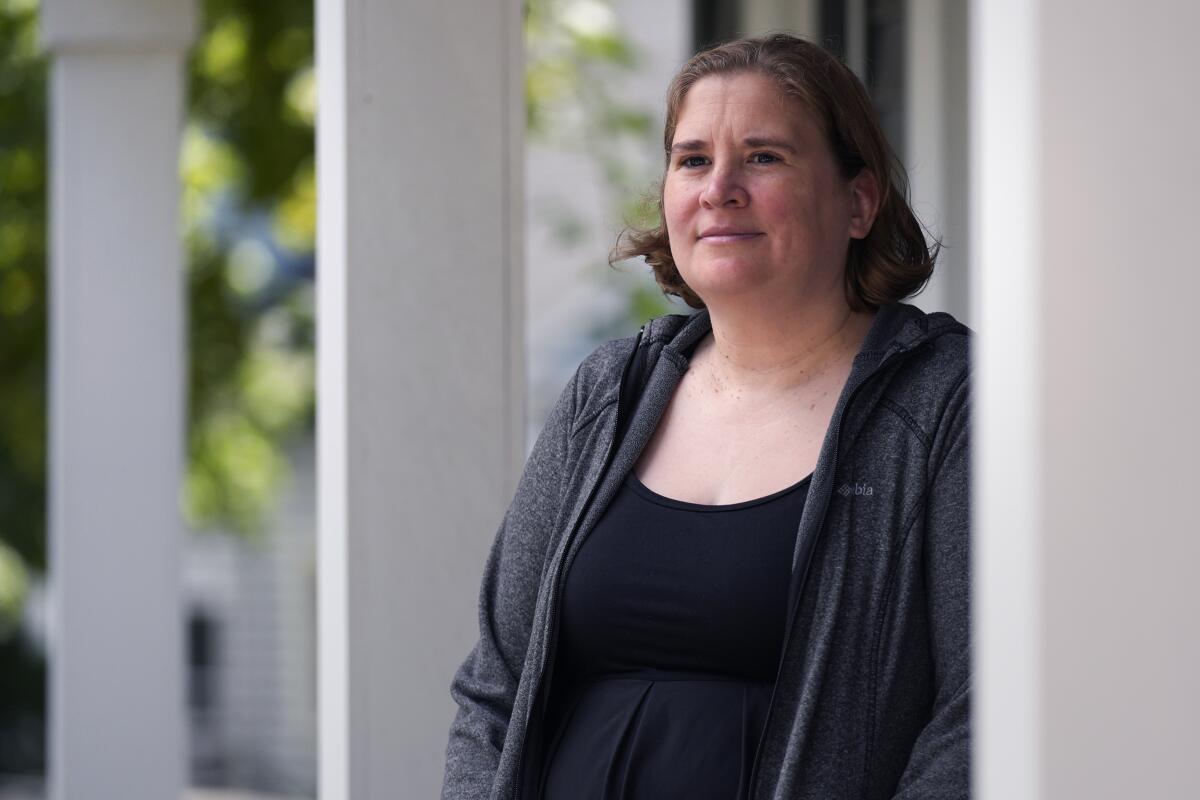 Rebecca Wood outside her home in Maynard, Mass.