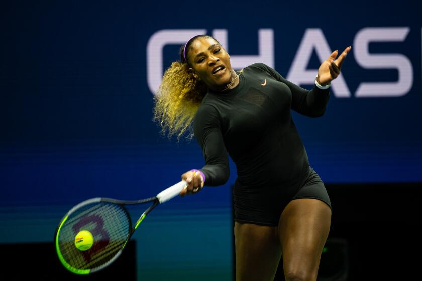 NEW YORK, NEW YORK - AUGUST 26: Serena Williams of the United States hits a forehand against Maria Sharapova of Russia in the first round of the US Open in Arthur Ashe Stadium at the USTA Billie Jean King National Tennis Center on August 26, 2019 in New York City. (Photo by TPN/Getty)