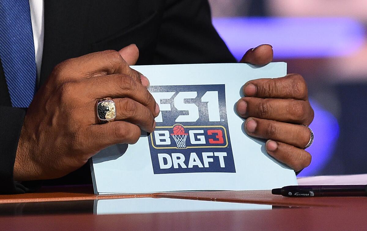 BIG3 league co-founder Ice Cube holds cue cards during the BIG3 2018 Draft at Fox Sports Studio in April 2018.