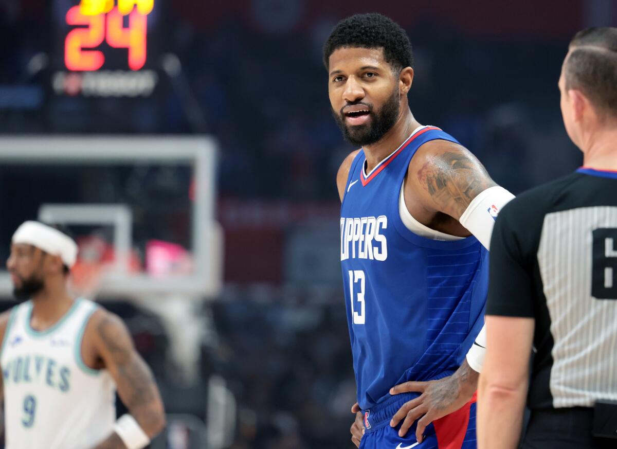 Clippers forward Paul George casts a glance toward a referee after a call during a game last season.