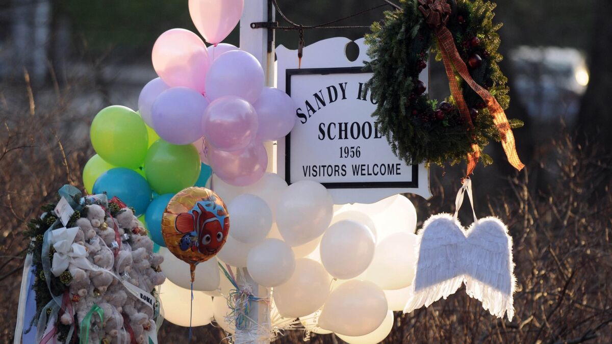 A memorial outside Sandy Hook Elementary School in Newtown, Conn., after the 2012 mass shooting.