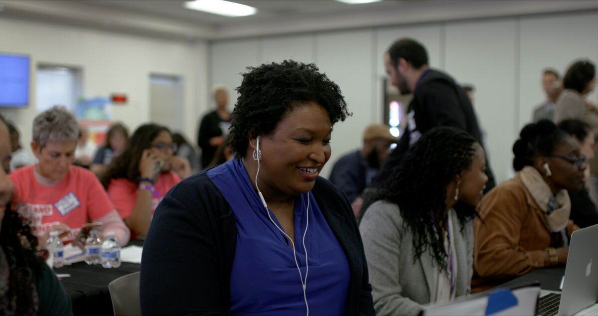 Stacey Abrams phone banks in "All In: The Fight for Democracy," an Amazon documentary about voter suppression.