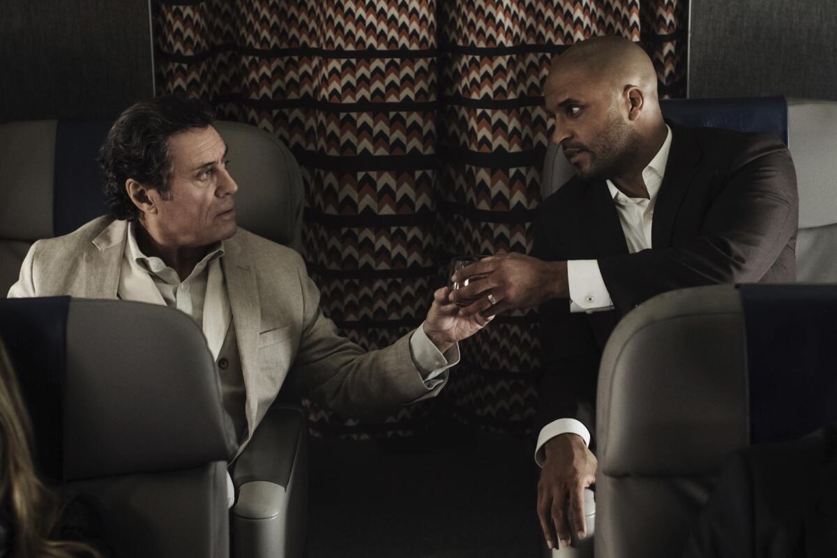 Ian McShane, left, and Ricky Whittle in "American Gods." (Jan Thijs / Starz)