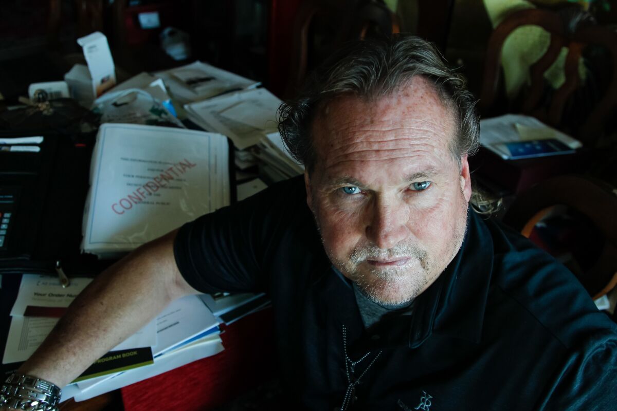 Private investigator Joseph Travers in a file photo taken at his Oceanside home, where he runs nonprofit Saved in America, works to recover runaways at risk for being forced into sex trafficking. Travers and his charity are now being sued for fraud.