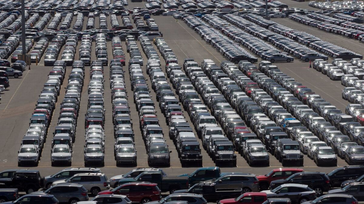 Thousands of cars wait to be distributed at the National City Marine Terminal where Pasha Automotive Services takes in and ships out cars via land sea and rail.