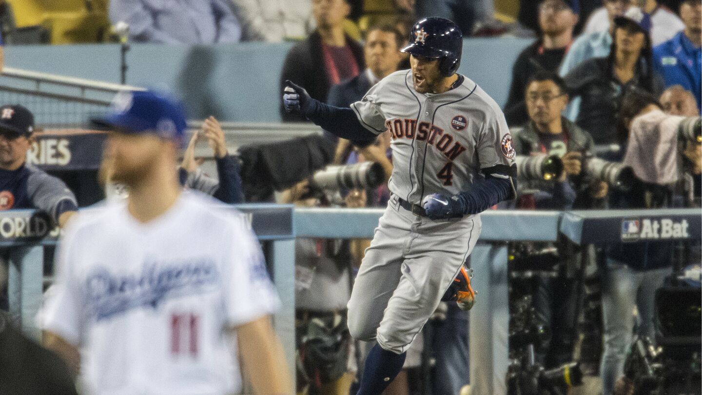 Houston Astros center fielder George Springerruns the bases after hitting a solo go-ahead homer in the third inning.