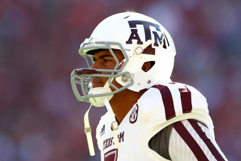 Texas A&M has suspended quarterback Kenny Hill two games for an unspecified violation of team rules.