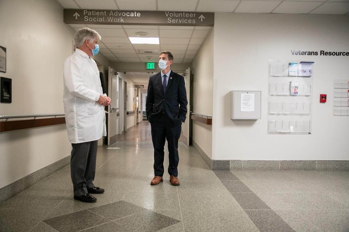 VA San Diego Healthcare System Director Dr. Robert M. Smith gives Congressman Mike Levin a tour of the hospital 