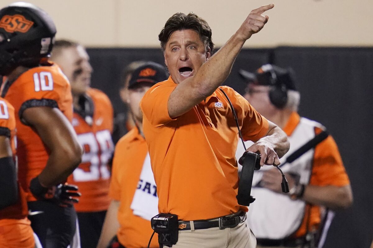 Oklahoma State coach Mike Gundy gestures to an official during a game against Baylor on Oct. 2.