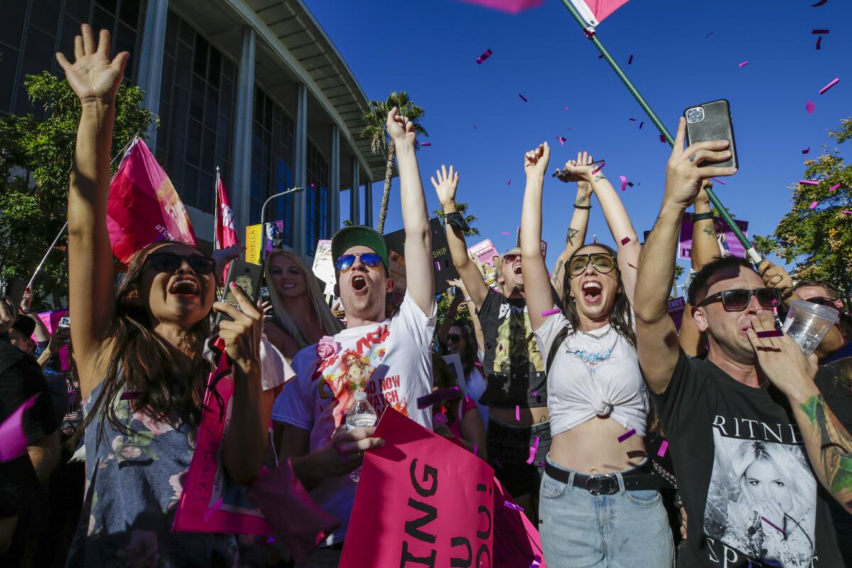 Free Britney supporters celebrate after hearing the conservatorship has ended