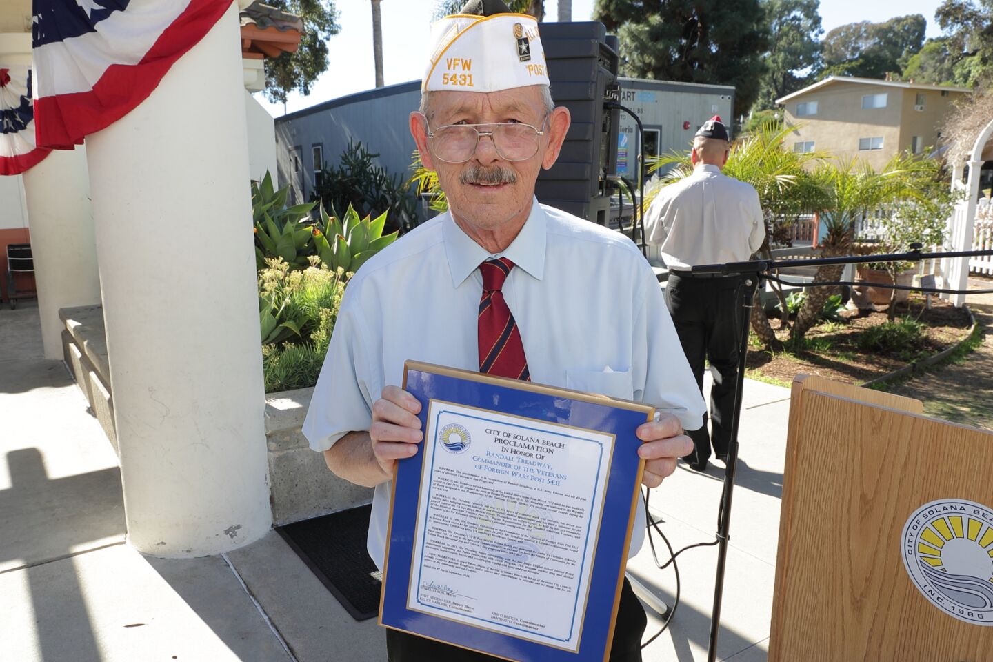 Randy Treadway with the proclamation from the Solana Beach honoring his dedication to veterans, the community, and his country.