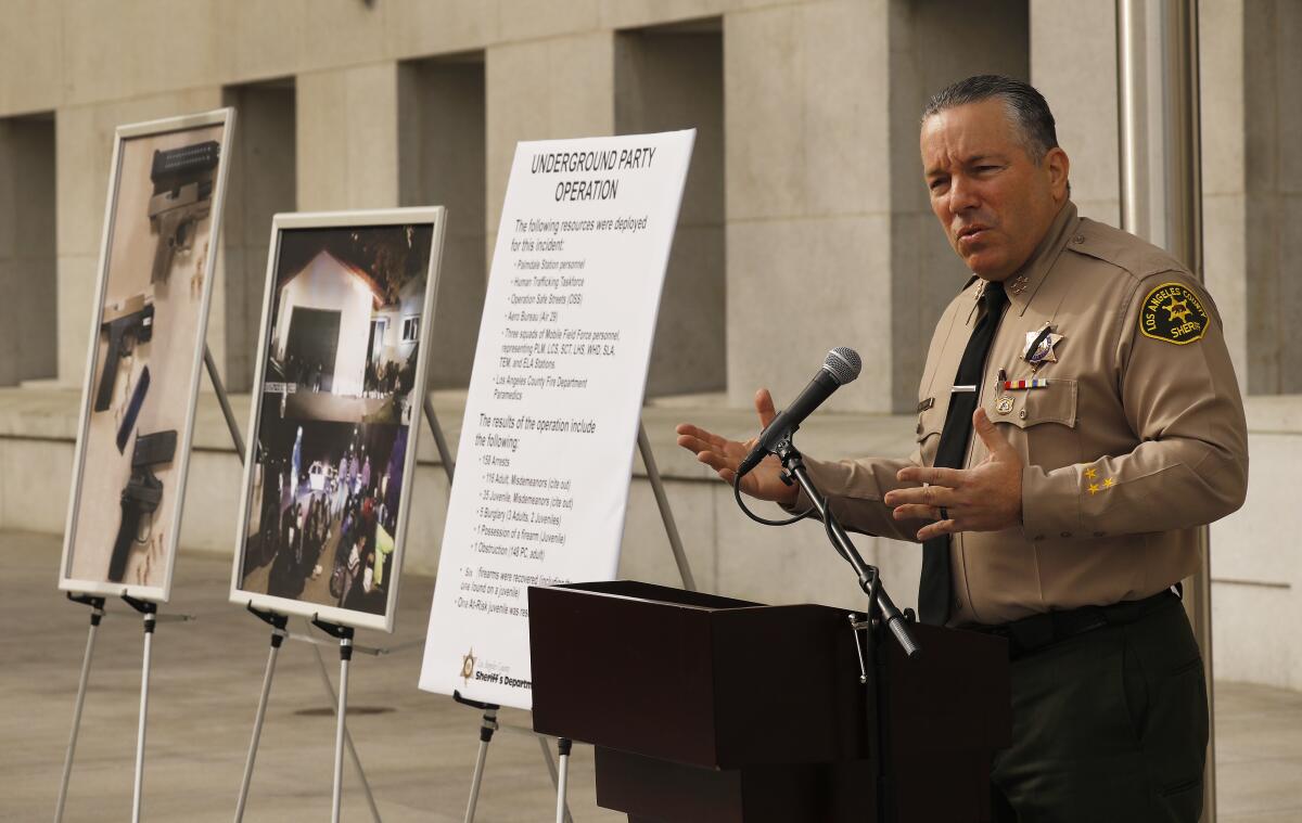 L.A. County Sheriff Alex Villanueva addresses a press conference on the steps of the Hall of Justice in downtown Los Angeles.