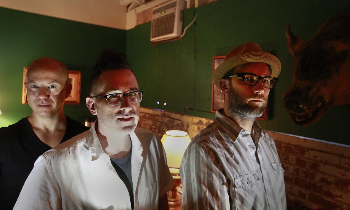 Producer Gordon Bijelonic, director Darren Bousman and production designer Derrick Hinmanhave sit in the Comfort Room inside their massive house of horror. "The Tension Experience: Ascension" takes up an entire city block in Boyle Heights.