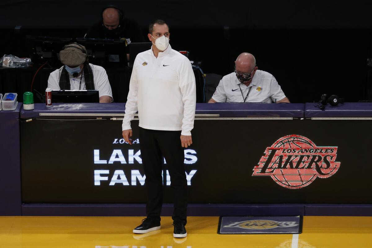 Lakers coach Frank Vogel wears a mask during a win over the Dallas Mavericks on Christmas.