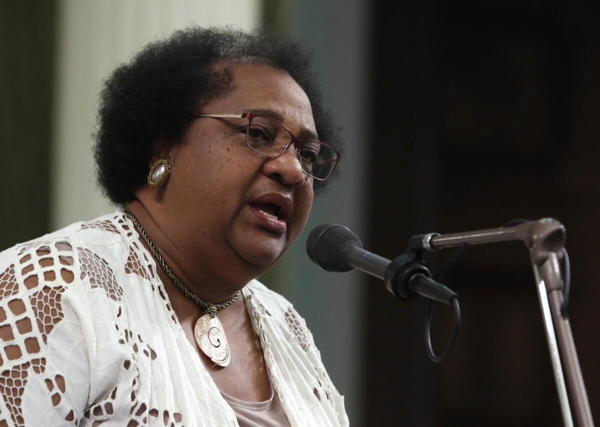 Assemblywoman Shirley Weber, D-San Diego, called on lawmakers to approve her resolution calling for a ban on the display of Confederate flags on federal property and state capitols, Monday, Aug. 17, 2015, in Sacramento,Calif. The Assembly unanimously approved the measure, AJR26, with 74 votes. (AP Photo/Rich Pedroncelli)
