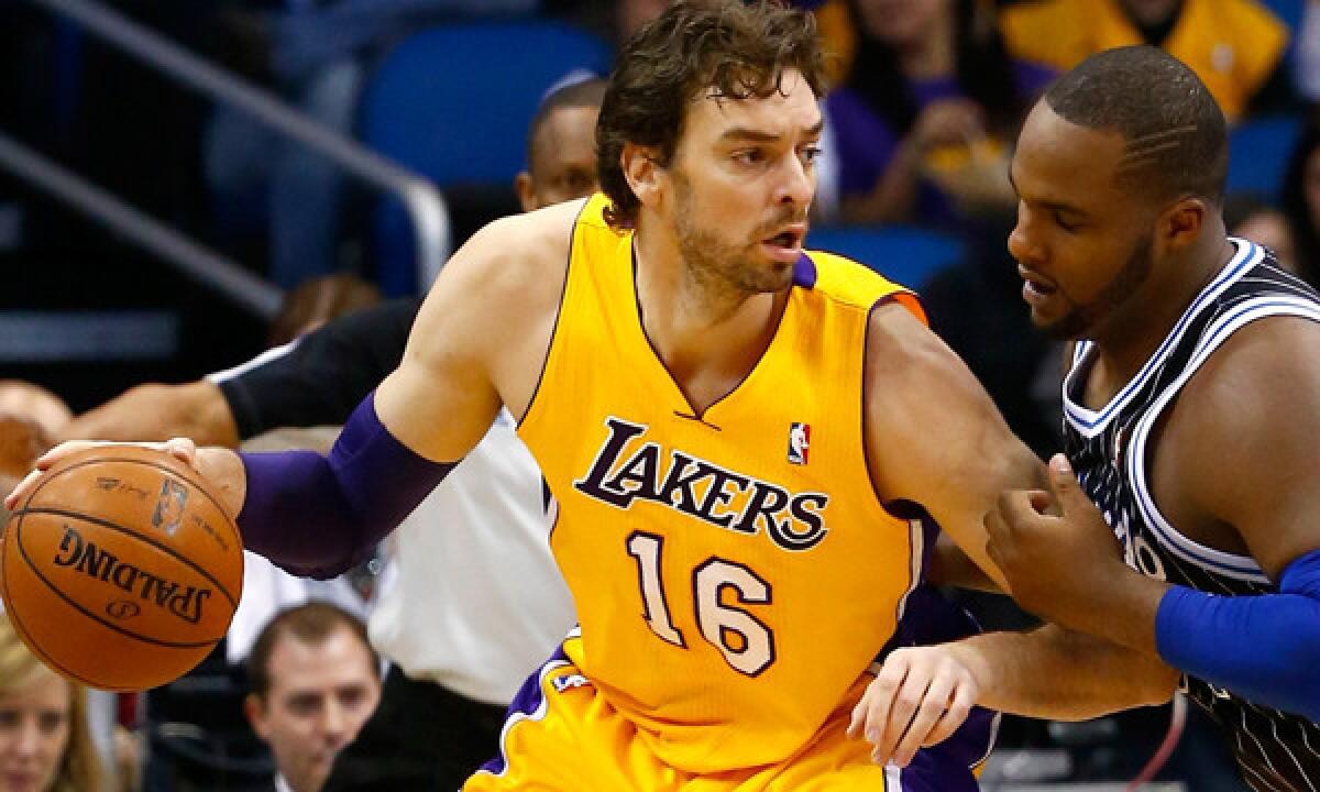 Lakers center Pau Gasol tries to work his way past Orlando's Glen Davis during Friday's loss.