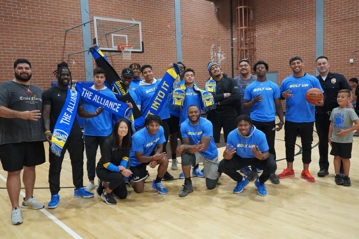 The Bruin Fan Alliance poses at a rec center .