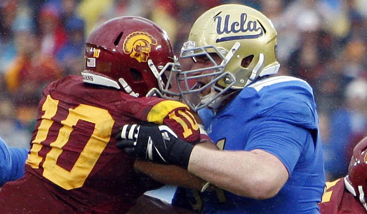 Injured UCLA center Jake Brendel was sorely missed against Virginia last Saturday.