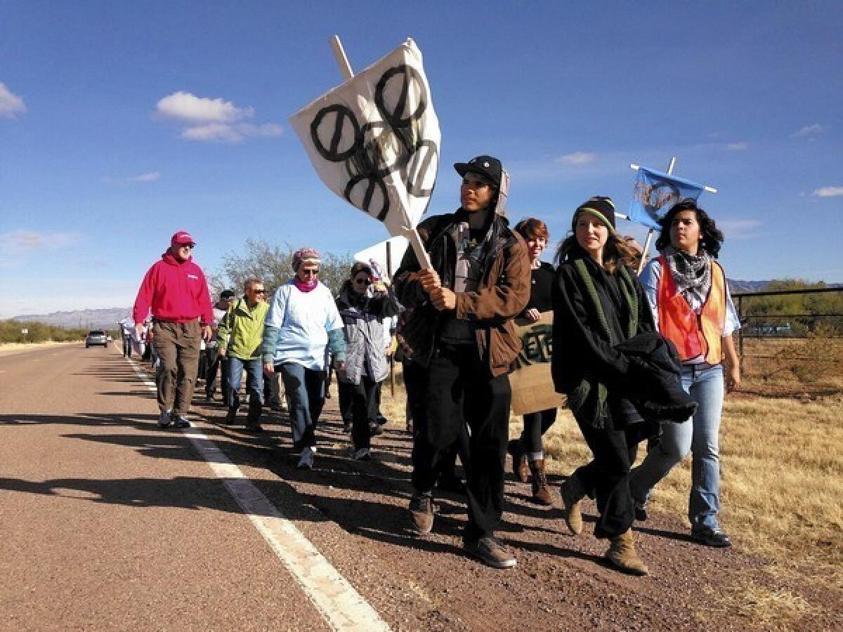 Members of People Helping People, a group founded by Arivaca, Ariz., residents last year to counter the miscommunication, confusion and fear that come with providing humanitarian aid to border crossers.