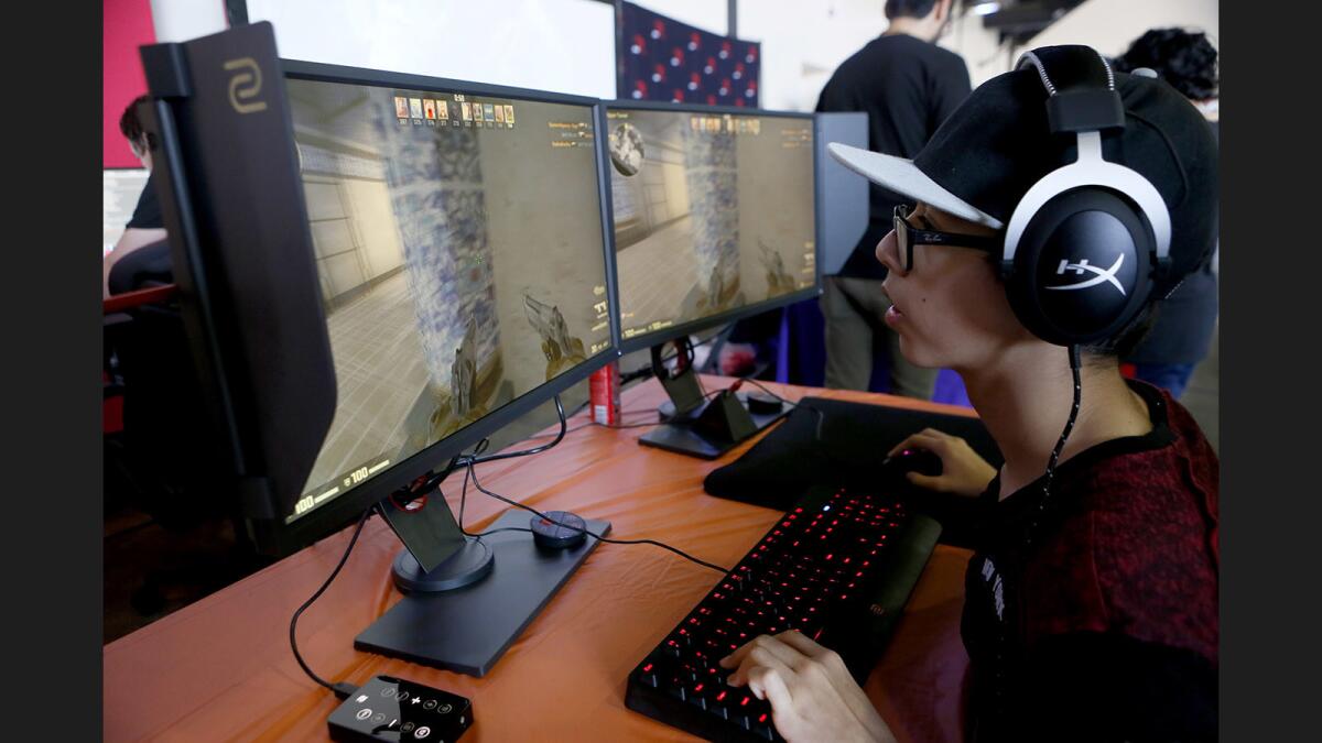 Huntington Beach resident Preston Sparks plays Counter-Strike: Global Offensive during the iBuyPower Gamefest at the 2017 Orange County Fair in Costa Mesa.
