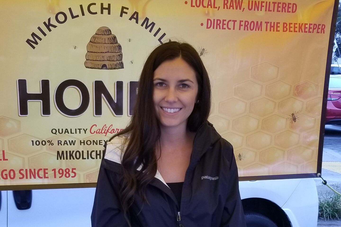 Erica Mikolich mixes 100 percent raw honey.
