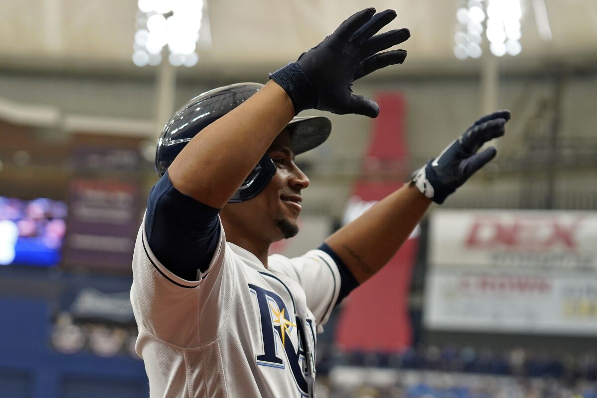 Tampa Bay Rays' Francisco Mejia celebrates his two-run home run off Baltimore Orioles starting pitcher Jordan Lyles during the third inning of a baseball game Saturday, April 9, 2022, in St. Petersburg, Fla. (AP Photo/Chris O'Meara)