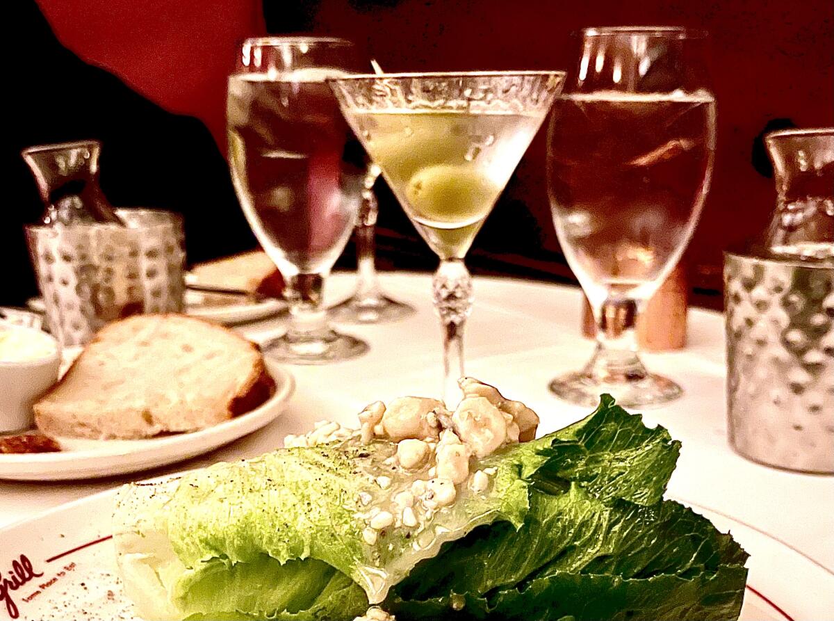 Chilled martini with "the dividend" chilling on the side, plus hearts of romaine salad at Musso & Frank Grill in Hollywood.