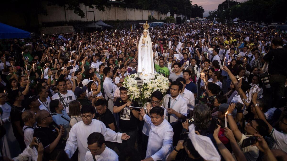 Thousands of people participate in a healing protest in Manila on Nov. 5, 2017.