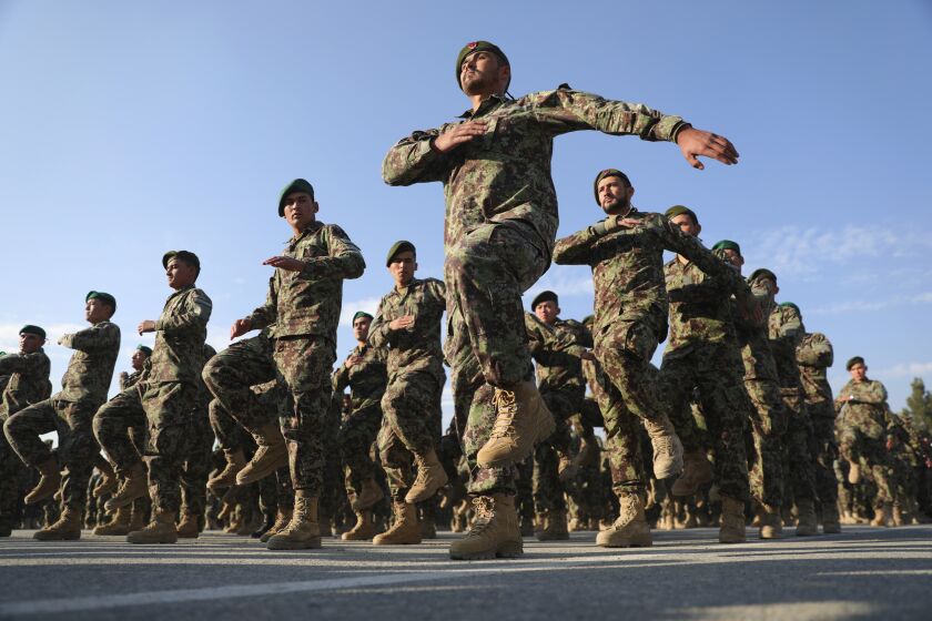 FILE - Newly graduated Afghan National Army personnel march during their graduation ceremony after a three month training program at the Afghan Military Academy in Kabul, Afghanistan on Nov. 29, 2020. U.N. Secretary-General Antonio Guterres said in a report obtained Sunday, Jan. 30, 2022, by The Associated Press, the world body has received “credible allegations” that more than 100 former members of the Afghan government, its security forces and those who worked with international troops have been killed since the Taliban takeover of the country on Aug. 15, 2021. (AP Photo/Rahmat Gul, File)