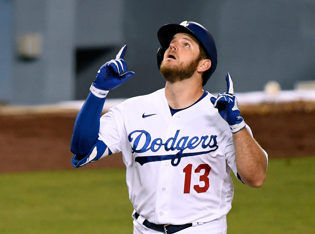 Dodgers second baseman Max Muncy celebrates after hitting a solo home run against the Giants on Thursday.