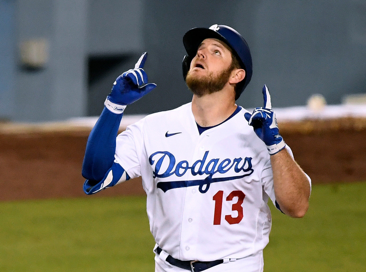 Dodgers second baseman Max Muncy celebrates after hitting a solo home run in the sixth inning.