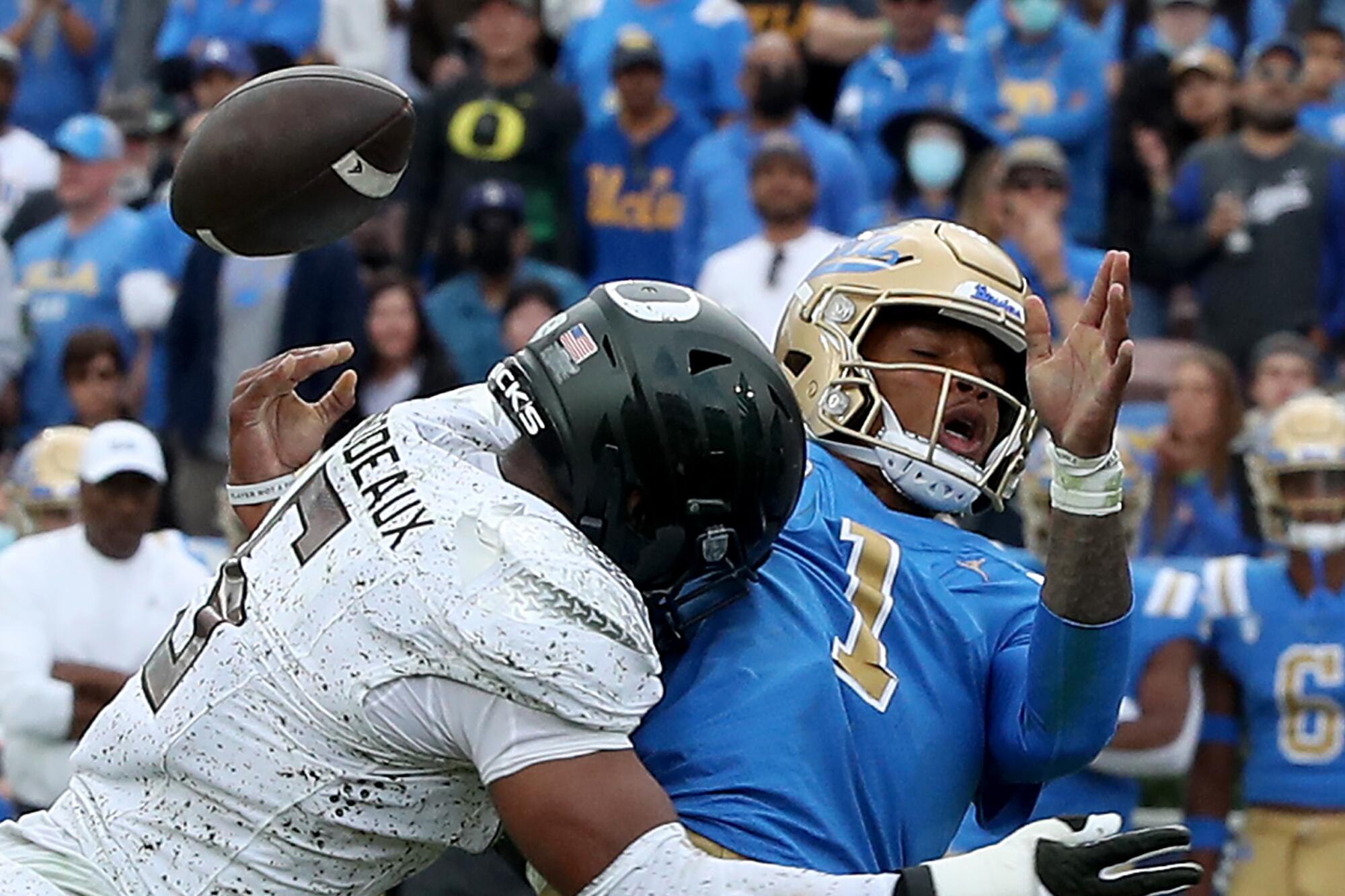 UCLA quarterback Dorian Thompson-Robinson fumbles.