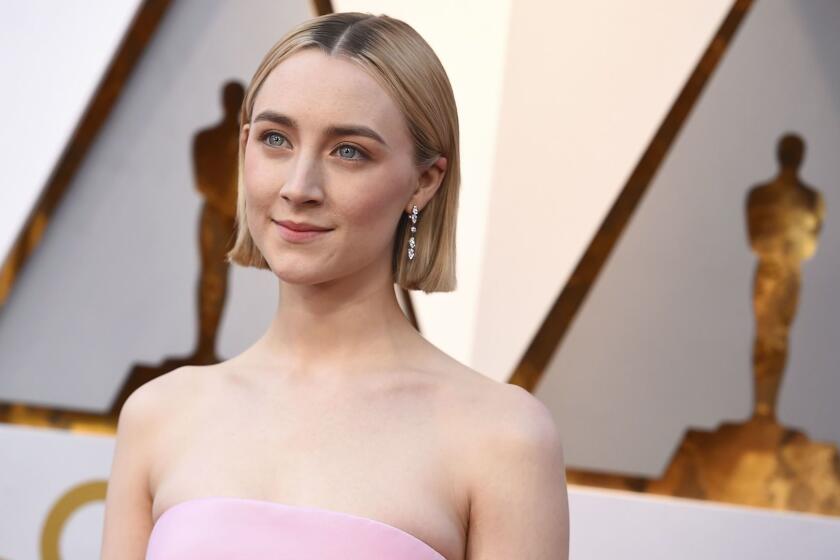 Mandatory Credit: Photo by Jordan Strauss/Invision/AP/REX/Shutterstock (9448539ir) Saoirse Ronan arrives at the Oscars, at the Dolby Theatre in Los Angeles 90th Academy Awards - Arrivals, Los Angeles, USA - 04 Mar 2018