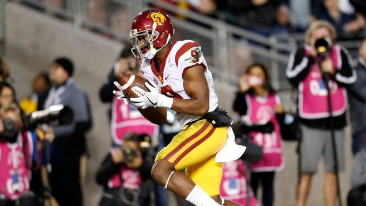 USC receiver JuJu Smith-Schuster catches a touchdown pass from quarterback Sam Darnold during the third quarter of the Trojans' Rose Bowl victory over Penn State, 52-49, on Jan. 2.