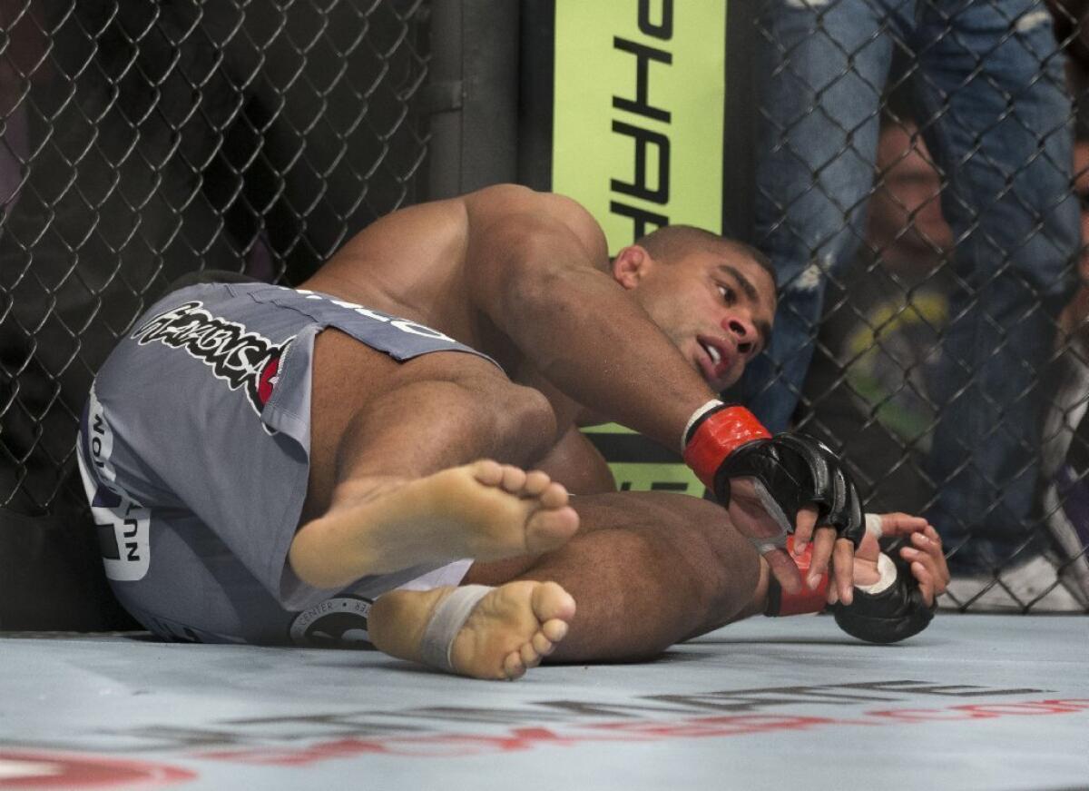 Alistair Overeem is sent to the mat by Antonio Silva during their bout on Feb. 2.