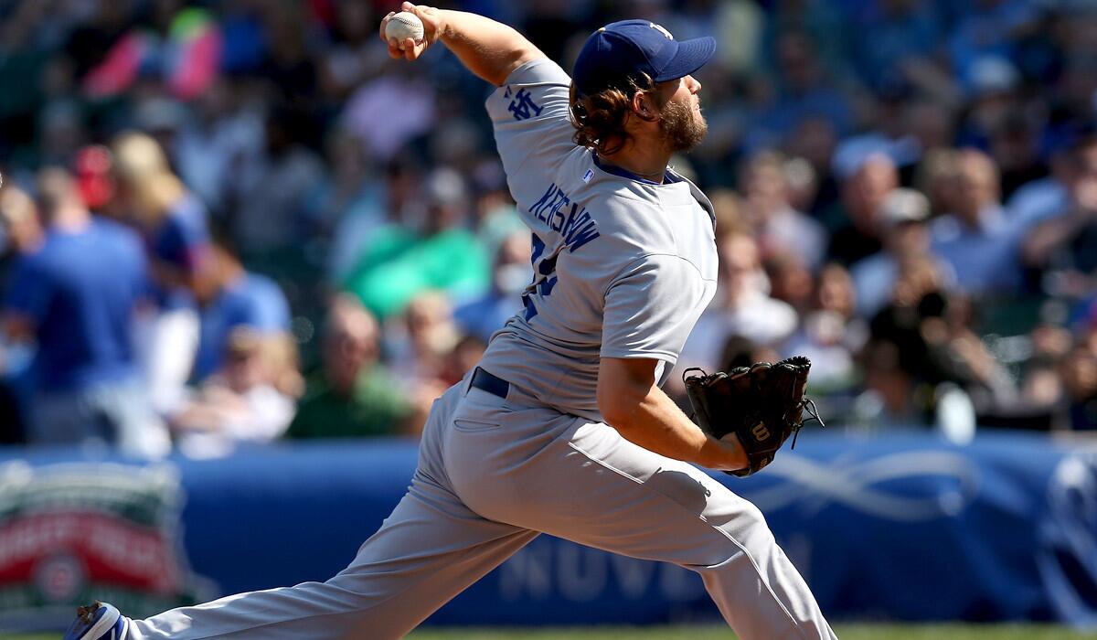 Dodgers starter Clayton Kershaw struggled at times Friday afternoon against the Cubs but still picked up a major league-leading 20th victory in the 14-5 victory.