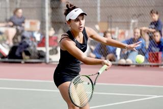 Granada Hills’ Leah Lazarian volleys in her first set at No. 3 singles on October, 25, 2023.