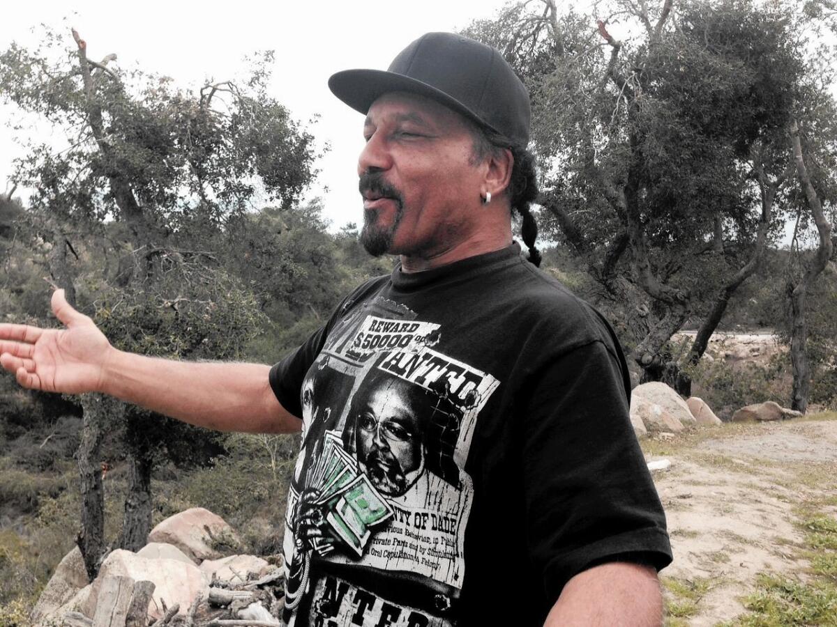 Ron Magee admires his five-acre property in the hills above Murrieta, which he may lose after being laid off from his good-paying aerospace job of 34 years.