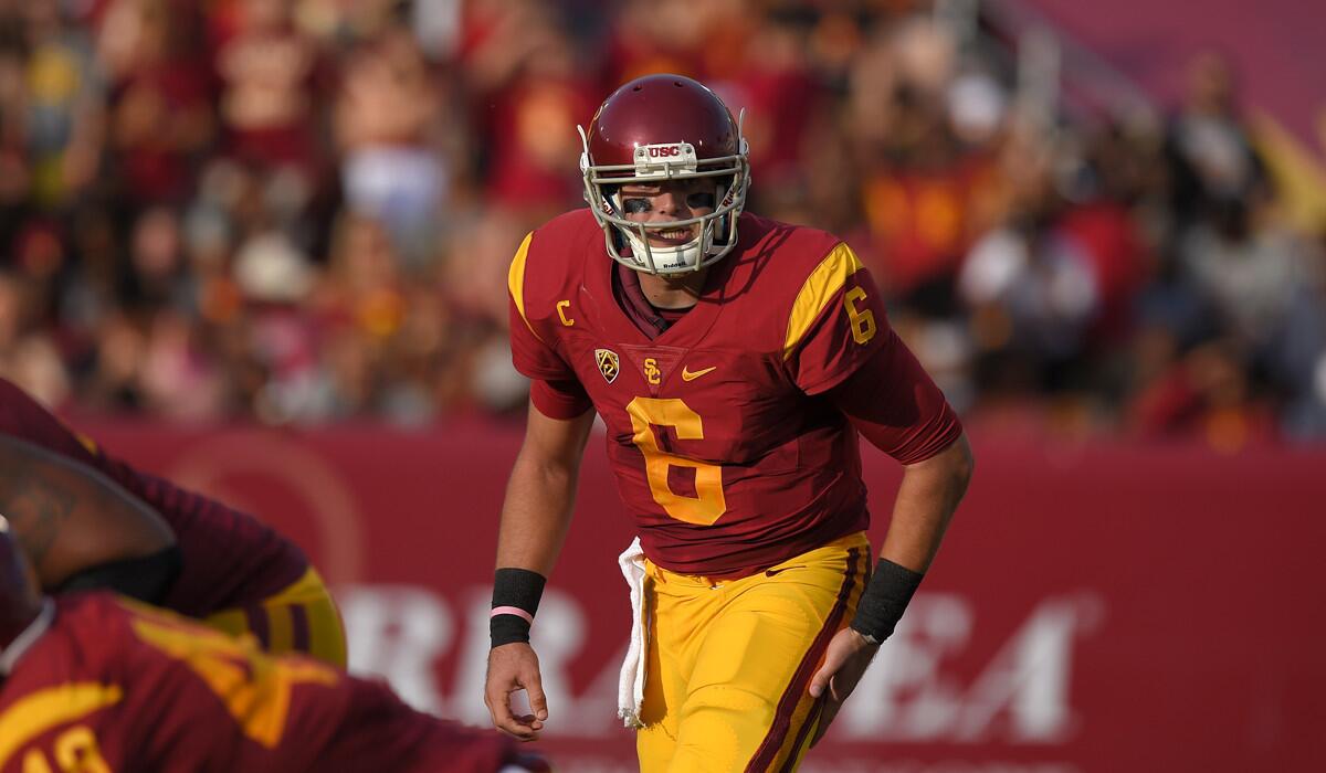 USC quarterback Cody Kessler gets set to run a play during the first half of the game against Utah last Saturday.