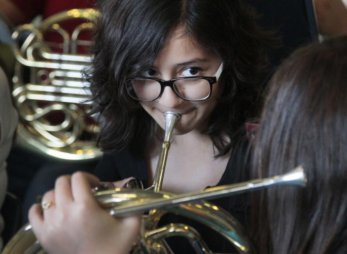 Vivian Trejo, a 13-year-old French horn player, has won a scholarship to the Colburn School in downtown Los Angeles.