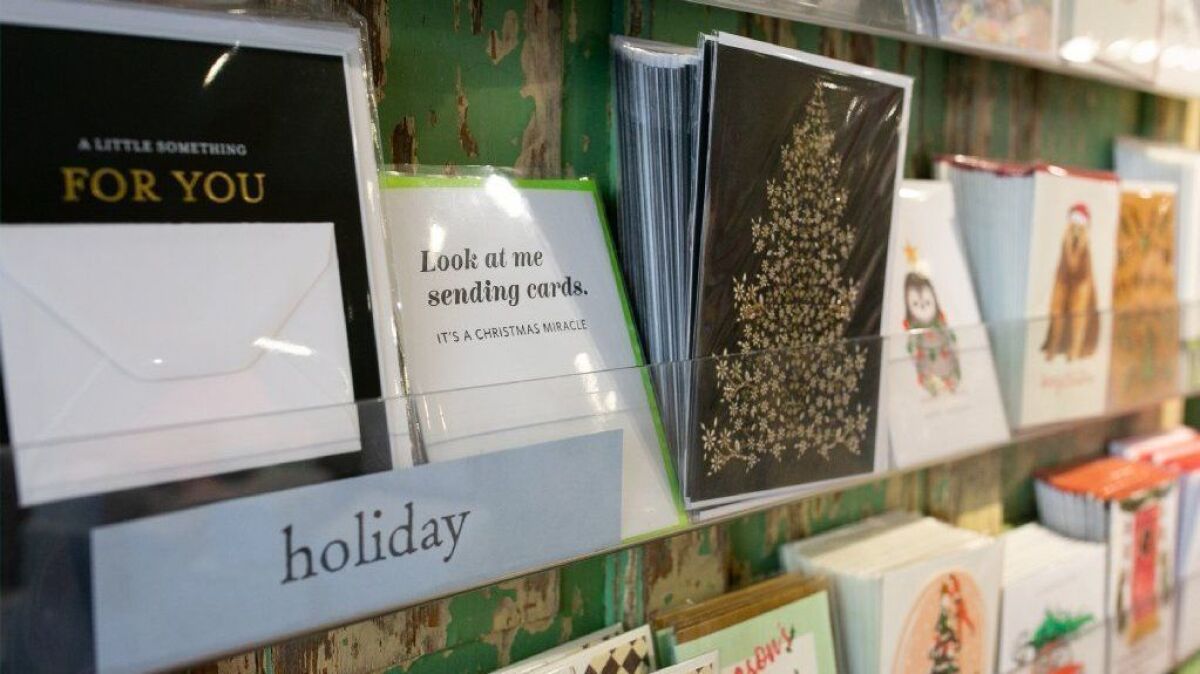 Despite all the ways to keep in touch online, paper cards are still a thriving holiday tradition.