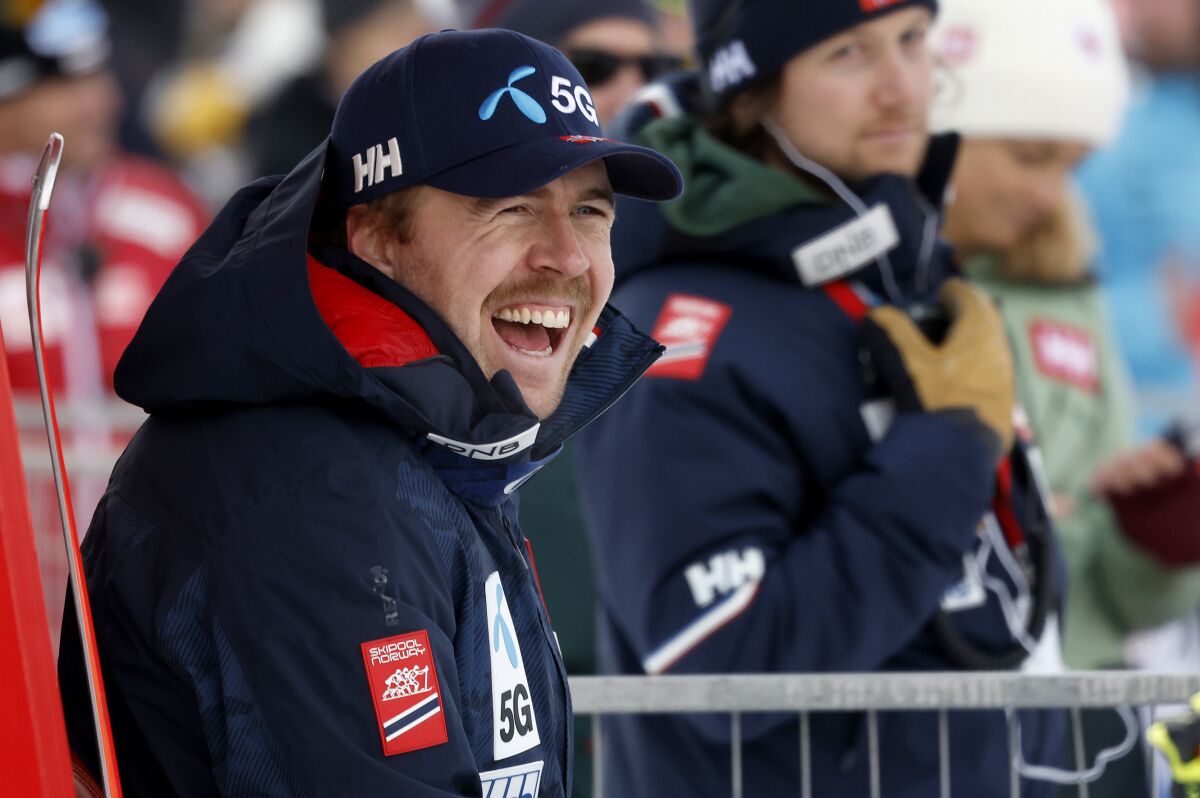 Norway's Aleksander Aamodt Kilde laughs at the bottom of the hill during the men's downhill ski race at the FIS Alpine Skiing World Cup in Lake Louise, Alberta, Saturday, Nov. 26, 2022. (Jeff McIntosh/The Canadian Press via AP)